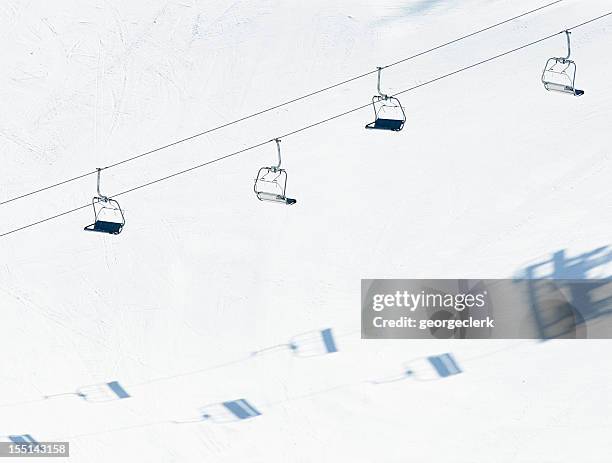 chairlift and ski piste - ski lift stock pictures, royalty-free photos & images