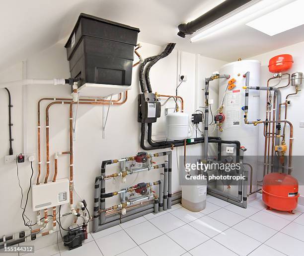 zentralheizung klimaanlage - water heater stock-fotos und bilder