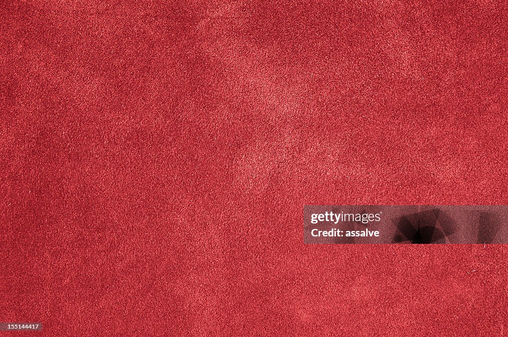 Feutre rouge, un tapis moelleux en velours ou arrière-plan