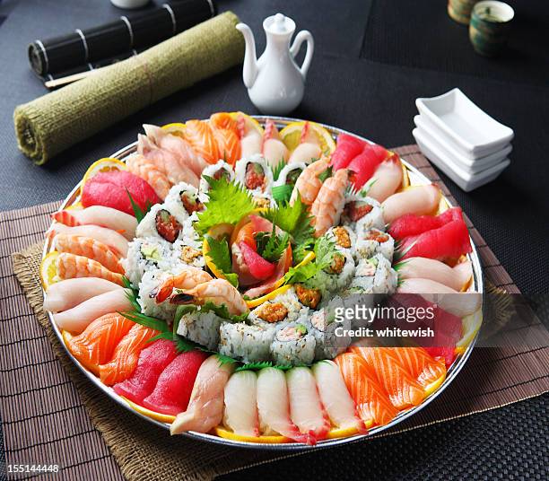 sushi & roll party tray - boiled shrimp stock pictures, royalty-free photos & images