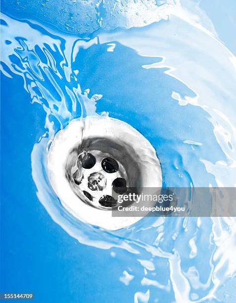 water flowing down the drain - watercourse stock pictures, royalty-free photos & images