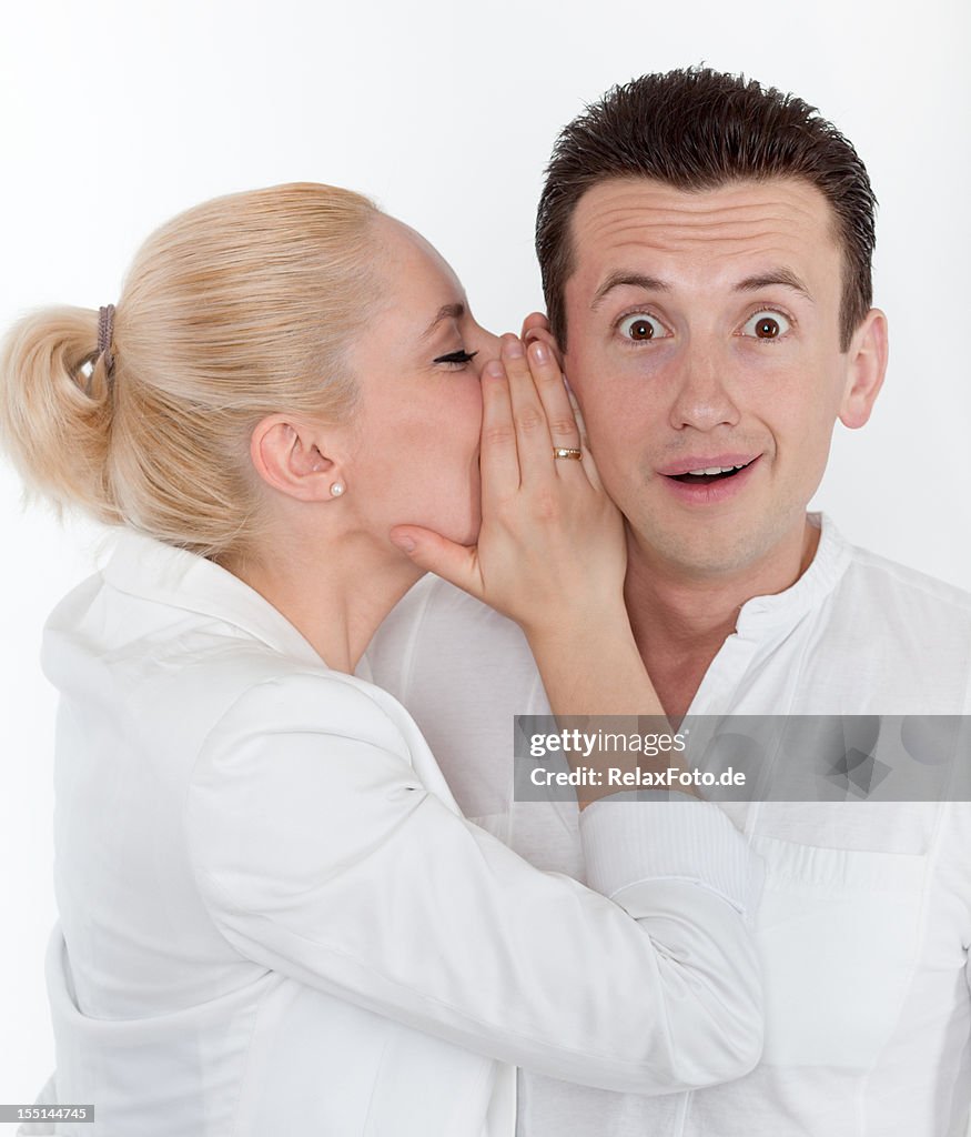 Secretive Communication Young Couple In Secret Communication High-Res Stock Photo - Getty Images