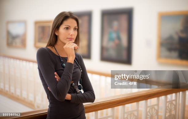 reflective woman in an art gallery (xxxl) - van gogh painting stock pictures, royalty-free photos & images