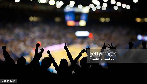 basketball excitement - silhouette sports crowd stock pictures, royalty-free photos & images