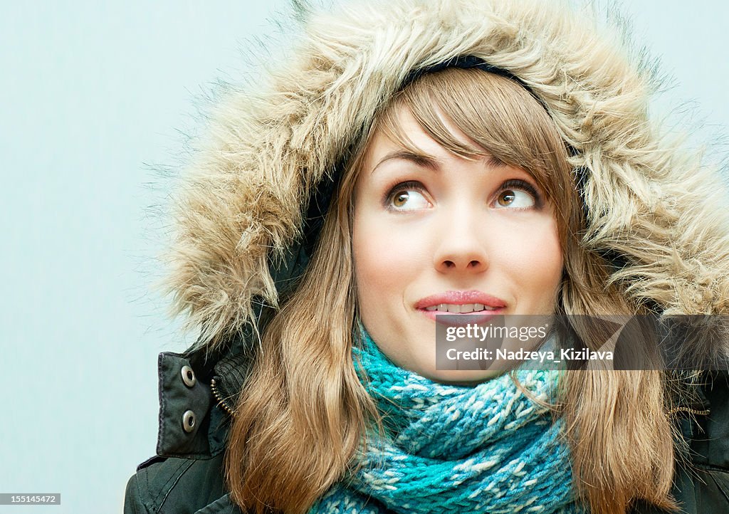 Young woman in winter clothes