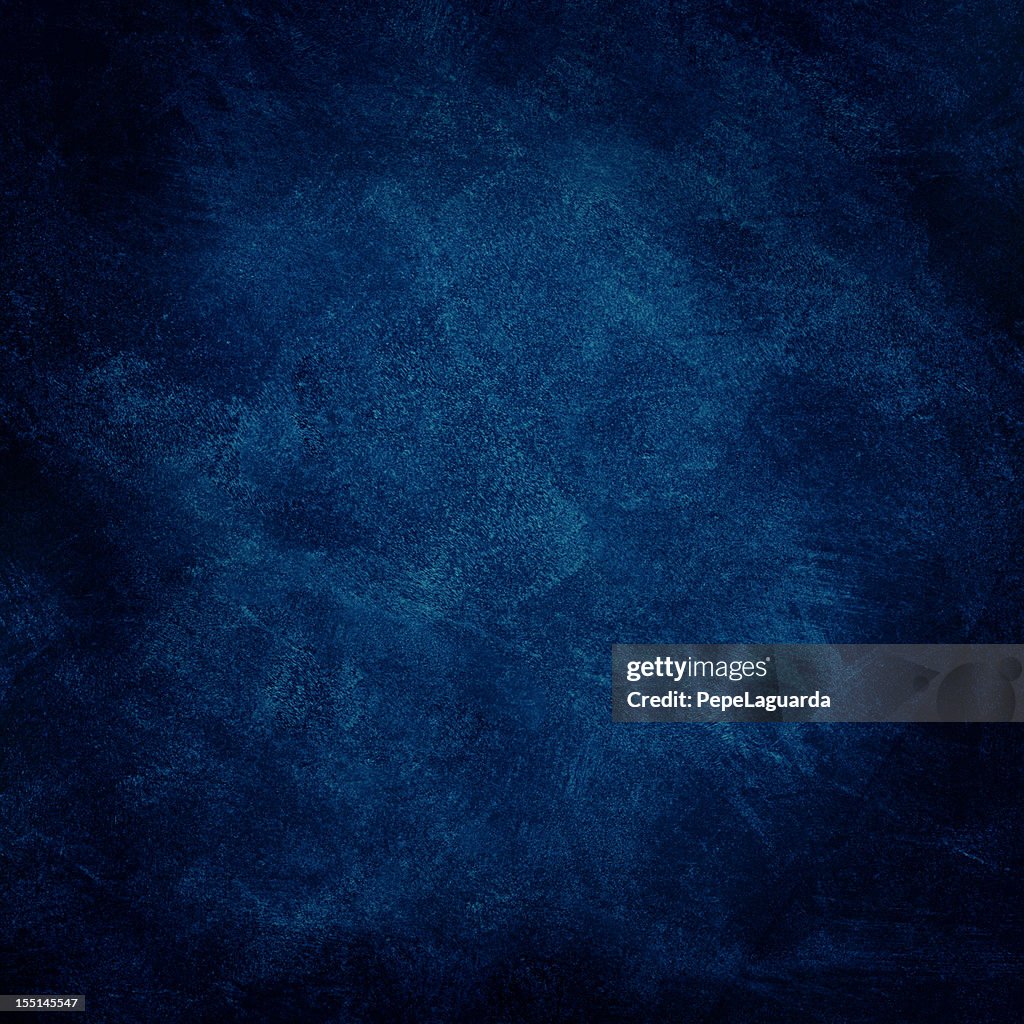 Dark blue grunge background