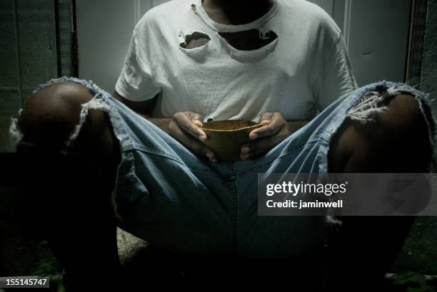 Rip Clothes Photos and Premium High Res Pictures - Getty Images