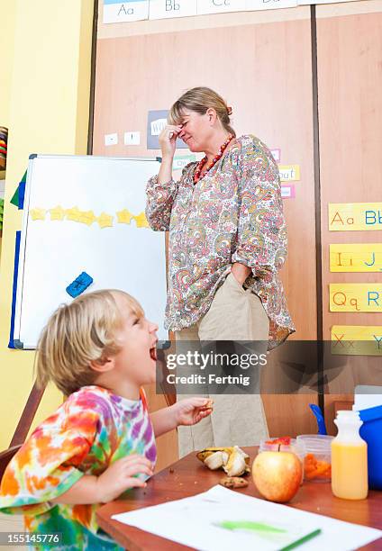 stressed teacher in the classroom - shouting in class stock pictures, royalty-free photos & images