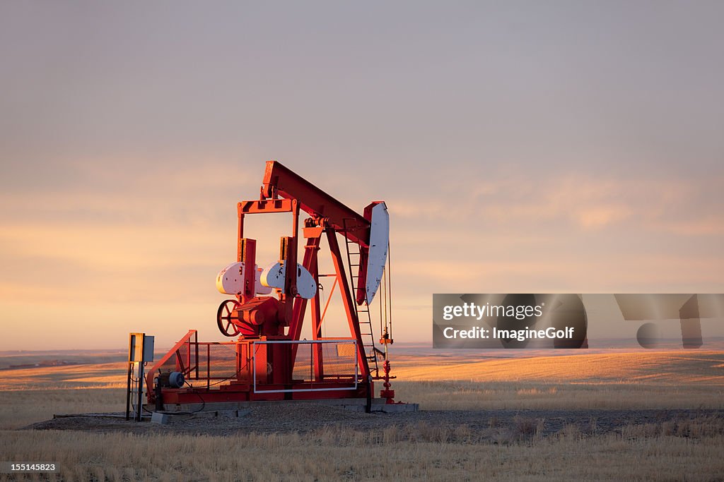 Red Prairie Pumpjack in Alberta Oil Field