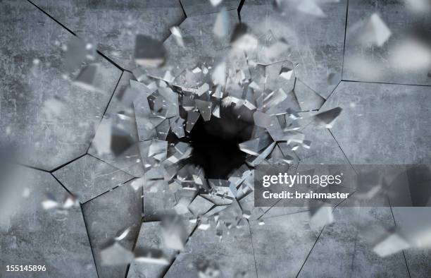 exploding concrete wall - keyhole stock pictures, royalty-free photos & images