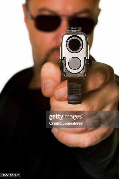 gunman - handgun stock pictures, royalty-free photos & images