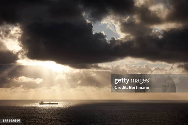 container ship after a storm - container ship storm stock pictures, royalty-free photos & images