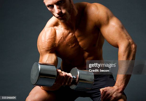 intense bodybuilder - vein muscle stock pictures, royalty-free photos & images