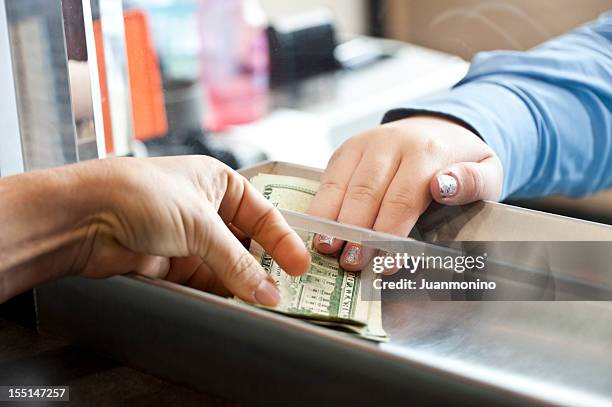 getting the cash - exchanging money stock pictures, royalty-free photos & images