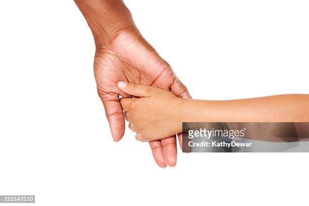 madre e figlio con le mani - darsi la mano foto e immagini stock
