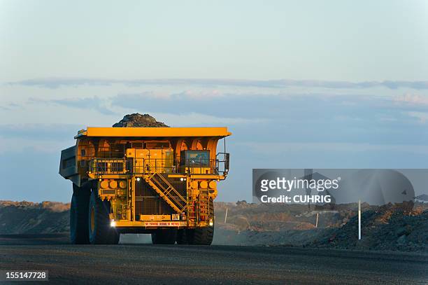 coal mining truck on haul road - queensland stock pictures, royalty-free photos & images