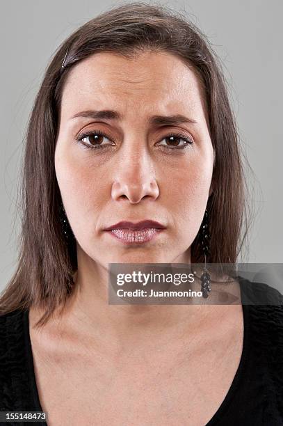 sad mature hispanic woman (real people) - pain face portrait stockfoto's en -beelden