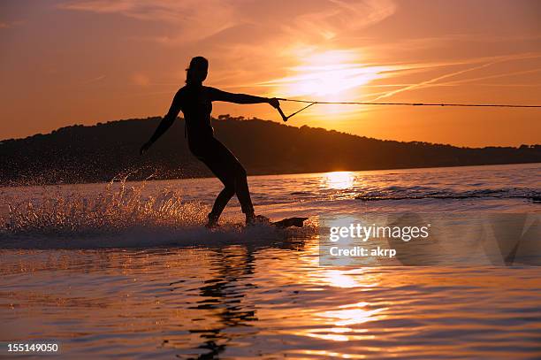 girl wakeboarding at french riviera - waterskiing stock pictures, royalty-free photos & images