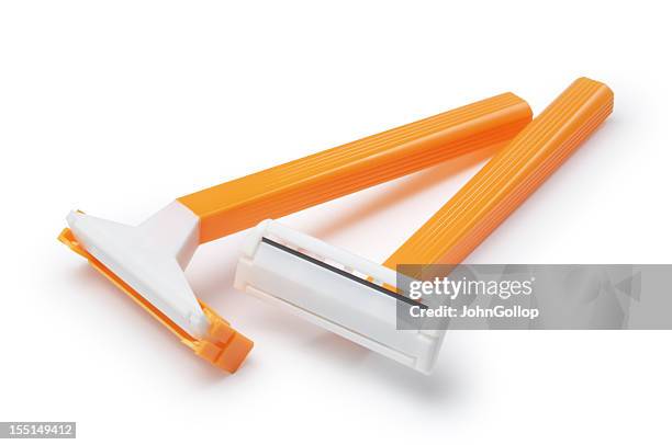 yellow basic pair of razors in white background - scheermes stockfoto's en -beelden