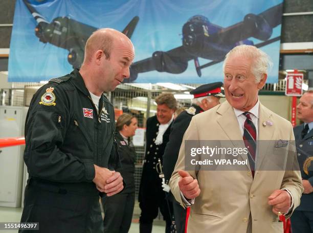 King Charles III meet staff and World War Two veterans as he visits the Battle of Britain Memorial Flight to commemorate the 80th anniversary of...