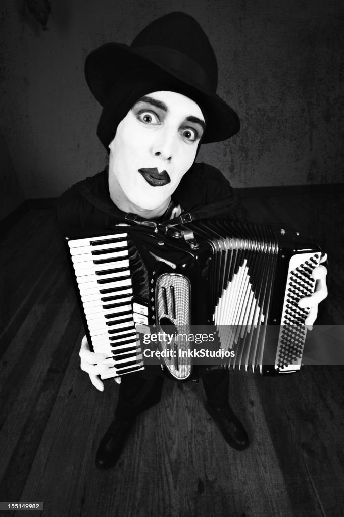 Mime Instrument Mime Playing Accordion High-Res Stock Photo - Getty Images