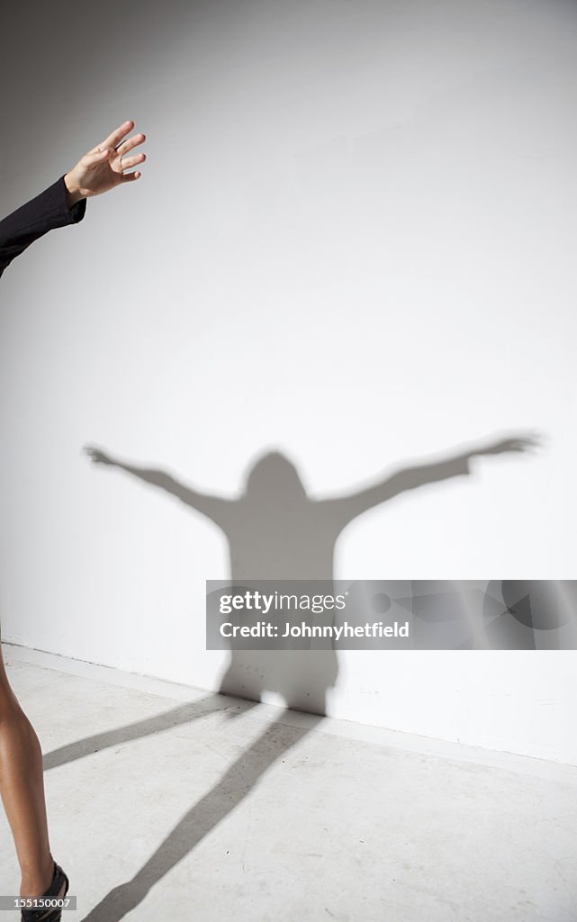 Humans Arm Shadow Shadow Of Person With Arms Out High-Res Stock Photo - Getty Images