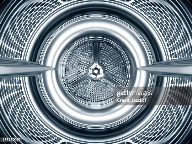 inside the steel drum of a washing machine - launderette stockfoto's en -beelden