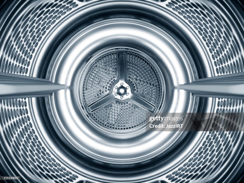 Inside the steel drum of a washing machine