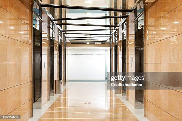 elevator hallway in the office building - elevator doors stock pictures, royalty-free photos & images