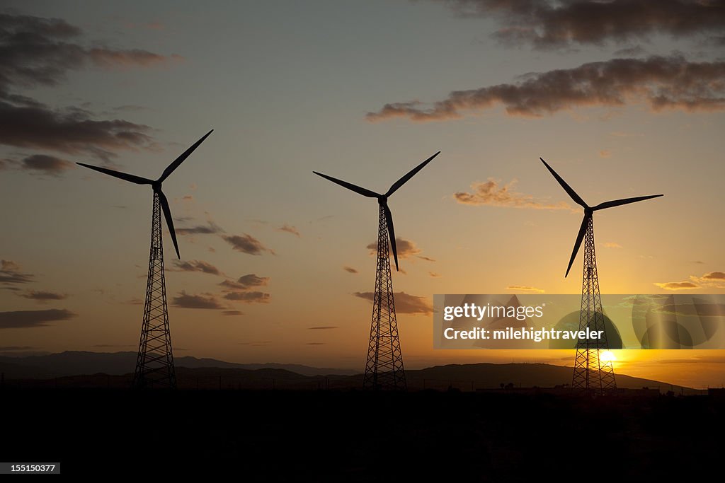 Sunrise over renewable wind turbine farm in Palm Springs California