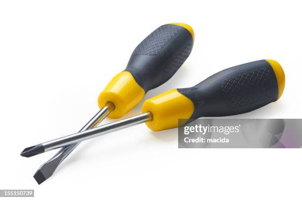a yellow and black handled philips and slot screwdriver - screwdriver stock pictures, royalty-free photos & images