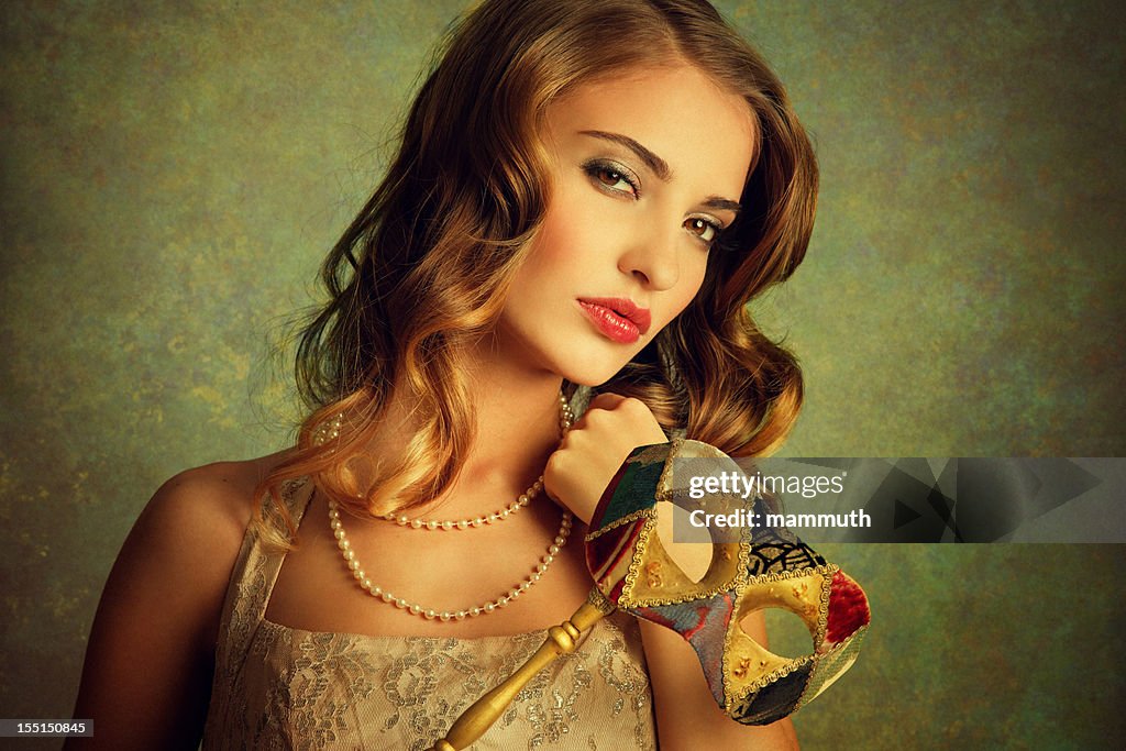 Girl with venetian mask