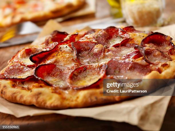 pepperoni pizza - flatbread pizza stock pictures, royalty-free photos & images