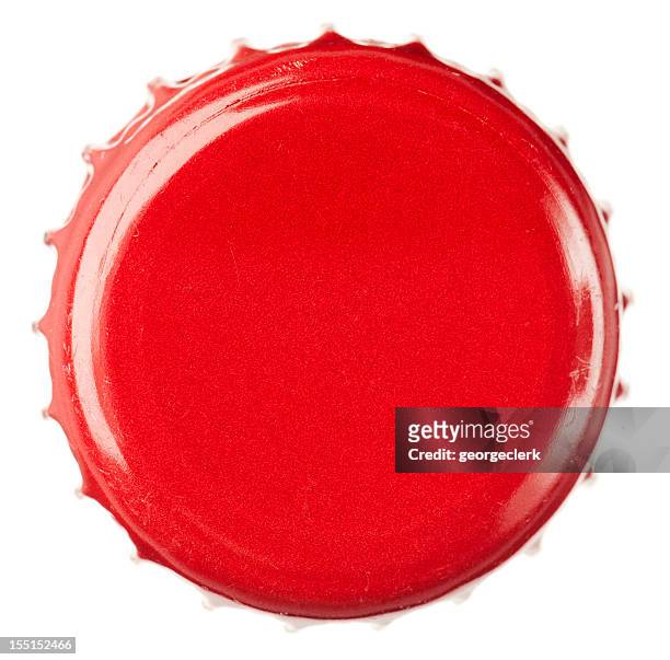 red bottle cap close-up - beer cap stock pictures, royalty-free photos & images