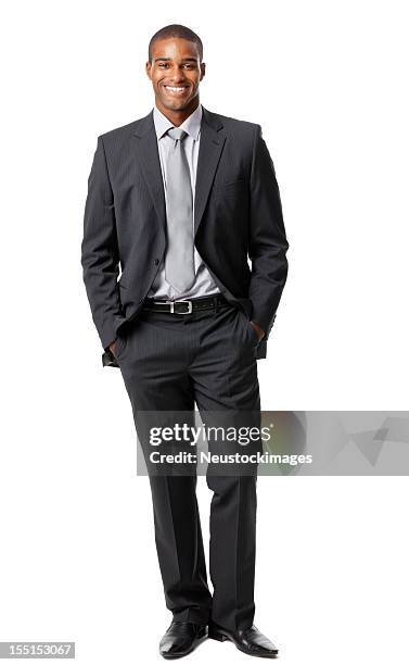 toma vertical de un hombre con un fondo blanco - hands in pockets fotografías e imágenes de stock