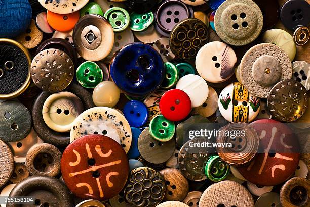 old sewing buttons - multi coloured buttons stock pictures, royalty-free photos & images