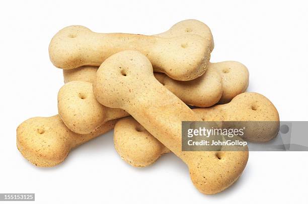 dog biscuit - dog biscuit stock pictures, royalty-free photos & images