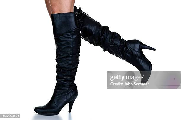 walking in  boots - black high heels stock pictures, royalty-free photos & images