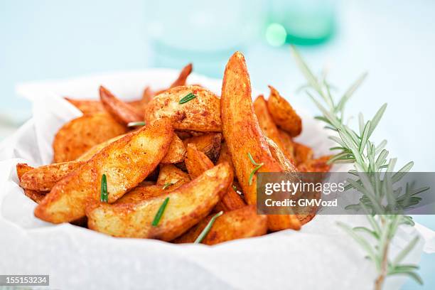 potato wedges - patatas bravas stock pictures, royalty-free photos & images