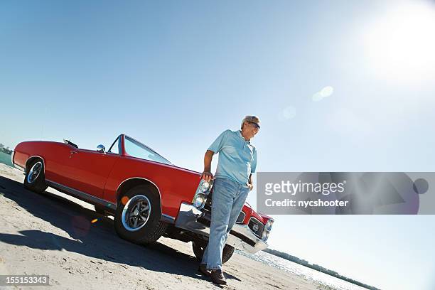 senior with classic convertible car - convertible isolated stock pictures, royalty-free photos & images