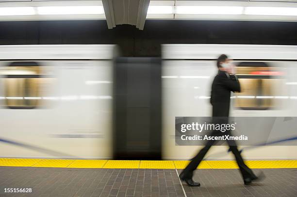 blurred motion shot of business commuter - generic location stock pictures, royalty-free photos & images