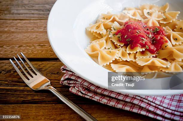 butterfly pasta - bow tie pasta stock pictures, royalty-free photos & images