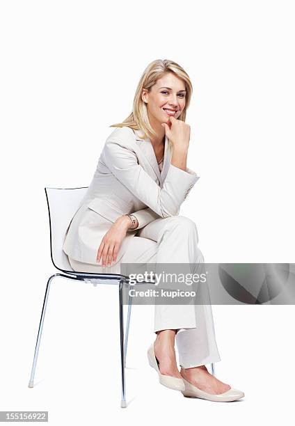 pretty woman sitting on a chair - chair isolated stock pictures, royalty-free photos & images