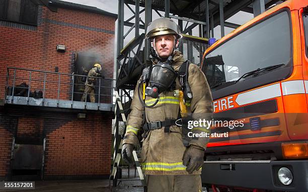 fireman - firefighter uk stock pictures, royalty-free photos & images