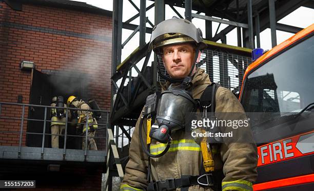 fireman - firefighter stock pictures, royalty-free photos & images