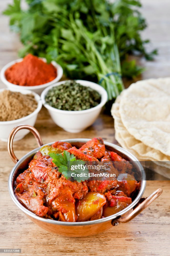 Table set for dinner with Indian curry