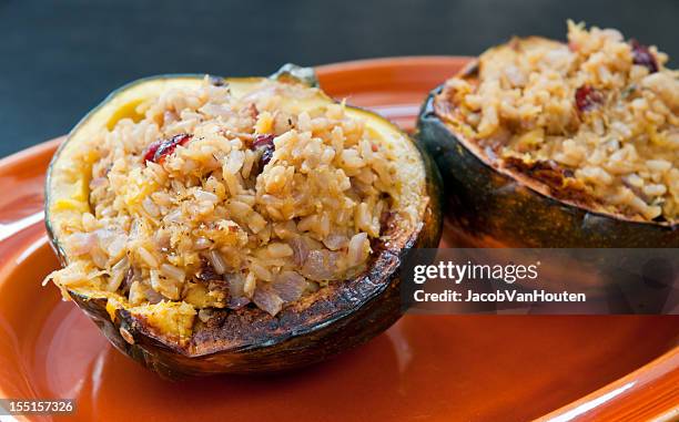 acorn squash stuffed with rice - acorn squash stock pictures, royalty-free photos & images