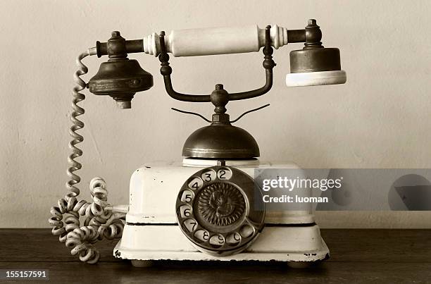very old telephone - antique telephone stock pictures, royalty-free photos & images