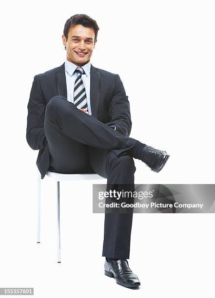 successful business man sitting and looking confident - man chair stockfoto's en -beelden