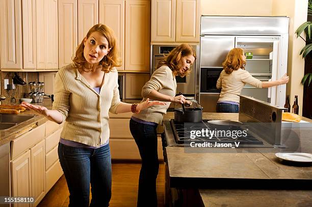 frau multitasking in der küche - cloning stock-fotos und bilder